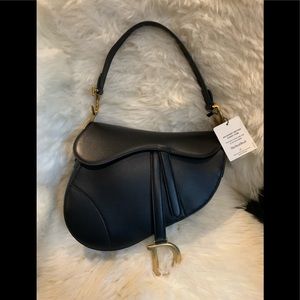 Dior black saddle bag for 2018!! Rare find 
.